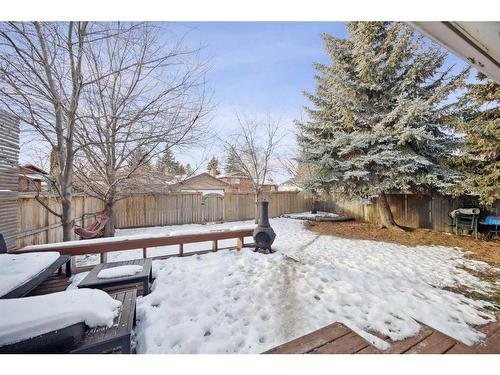 739 Queensland Drive Se, Calgary, AB - Outdoor With Backyard