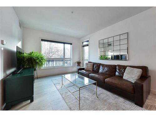 108-145 Burma Star Road Sw, Calgary, AB - Indoor Photo Showing Living Room