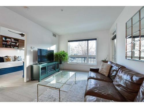 108-145 Burma Star Road Sw, Calgary, AB - Indoor Photo Showing Living Room