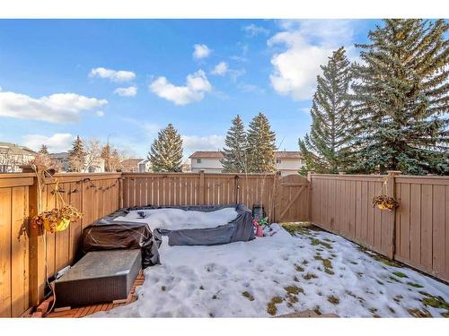 44-1515 Falconridge Drive Ne, Calgary, AB - Outdoor With Backyard