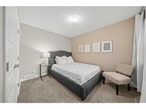 18 Masters Villas Se, Calgary, AB - Indoor Photo Showing Bedroom