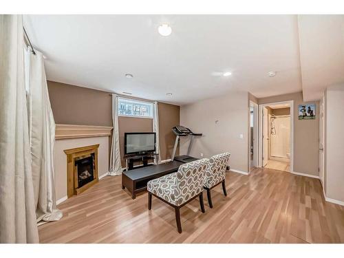 45 Everhollow Park Sw, Calgary, AB - Indoor With Fireplace