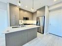 2214-395 Skyview Parkway Ne, Calgary, AB  - Indoor Photo Showing Kitchen With Double Sink With Upgraded Kitchen 