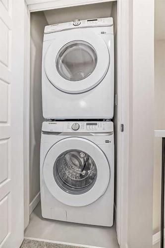 213 Sherwood Lane Nw, Calgary, AB - Indoor Photo Showing Laundry Room