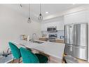 906-10060 46 Street Ne, Calgary, AB  - Indoor Photo Showing Kitchen With Stainless Steel Kitchen With Double Sink With Upgraded Kitchen 