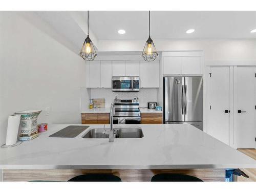 906-10060 46 Street Ne, Calgary, AB - Indoor Photo Showing Kitchen With Stainless Steel Kitchen With Double Sink With Upgraded Kitchen