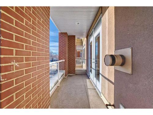 301-4 Hemlock Crescent Sw, Calgary, AB - Outdoor With Balcony With Exterior