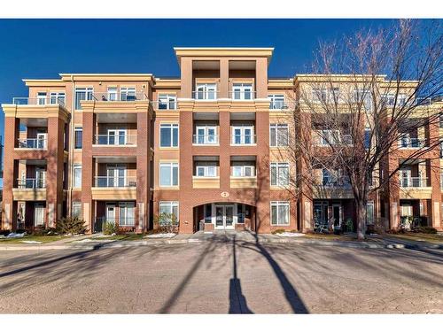 301-4 Hemlock Crescent Sw, Calgary, AB - Outdoor With Balcony With Facade