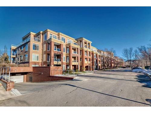 301-4 Hemlock Crescent Sw, Calgary, AB - Outdoor With Balcony With Facade