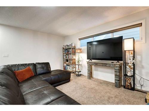 50 Riviera View, Cochrane, AB - Indoor Photo Showing Living Room