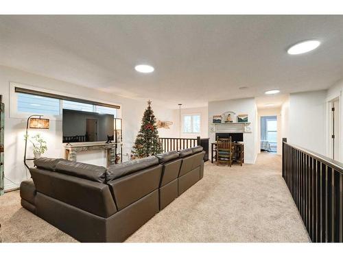 50 Riviera View, Cochrane, AB - Indoor Photo Showing Living Room