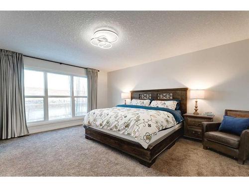 50 Riviera View, Cochrane, AB - Indoor Photo Showing Bedroom