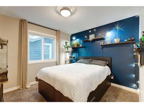 50 Riviera View, Cochrane, AB - Indoor Photo Showing Bedroom