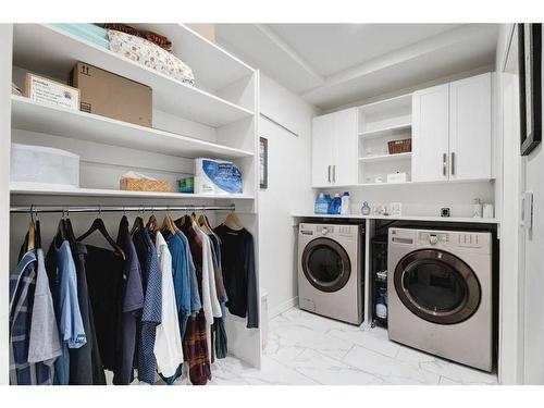 50 Riviera View, Cochrane, AB - Indoor Photo Showing Laundry Room