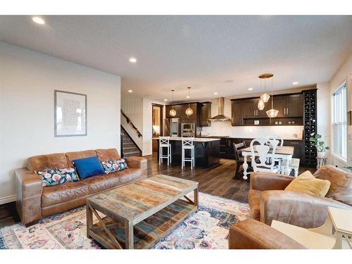 50 Riviera View, Cochrane, AB - Indoor Photo Showing Living Room