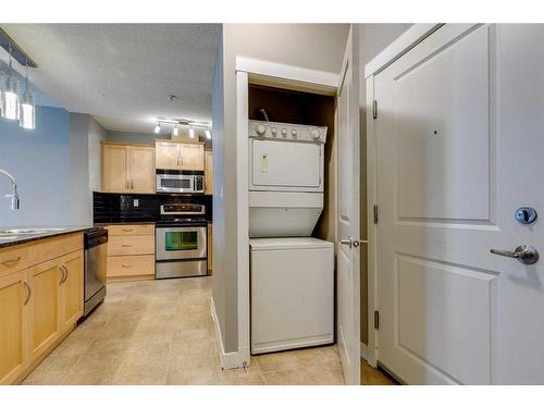 1104-5605 Henwood Street Sw, Calgary, AB - Indoor Photo Showing Laundry Room