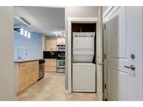 1104-5605 Henwood Street Sw, Calgary, AB - Indoor Photo Showing Laundry Room