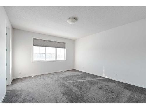 76 Carrington Close Nw, Calgary, AB - Indoor Photo Showing Other Room