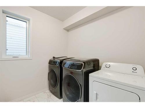 76 Carrington Close Nw, Calgary, AB - Indoor Photo Showing Laundry Room