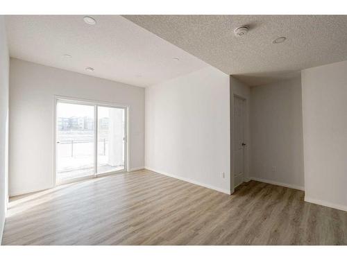 76 Carrington Close Nw, Calgary, AB - Indoor Photo Showing Other Room