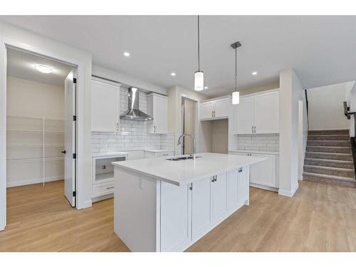 1642 Baywater Street Sw, Airdrie, AB - Indoor Photo Showing Kitchen With Upgraded Kitchen