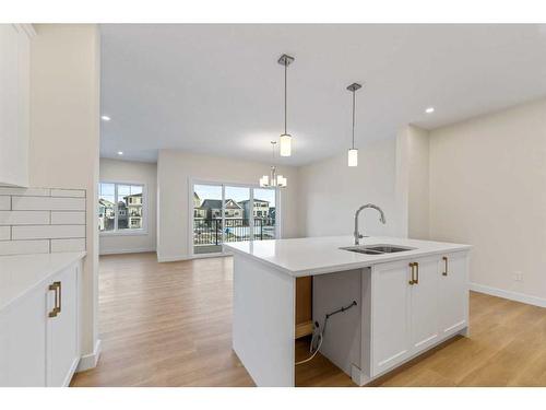 1642 Baywater Street Sw, Airdrie, AB - Indoor Photo Showing Kitchen With Double Sink