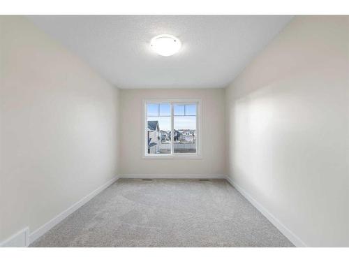 1642 Baywater Street Sw, Airdrie, AB - Indoor Photo Showing Other Room