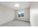 1642 Baywater Street Sw, Airdrie, AB  - Indoor Photo Showing Other Room 