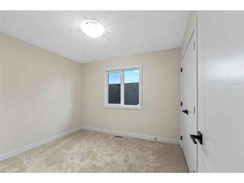 1642 Baywater Street Sw, Airdrie, AB - Indoor Photo Showing Other Room