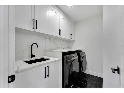 179 Sandpiper Park, Chestermere, AB - Indoor Photo Showing Laundry Room