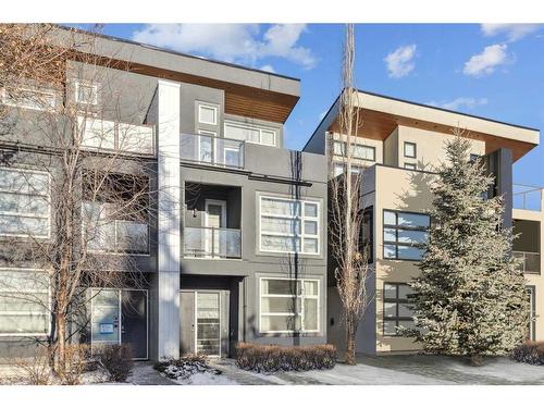 1-836 Mcpherson Road Ne, Calgary, AB - Outdoor With Balcony With Facade