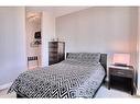 2405-225 11 Avenue Se, Calgary, AB  - Indoor Photo Showing Bedroom 