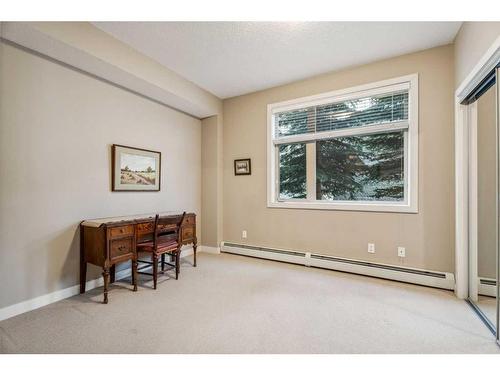 104-35 Aspenmont Heights Sw, Calgary, AB - Indoor Photo Showing Other Room