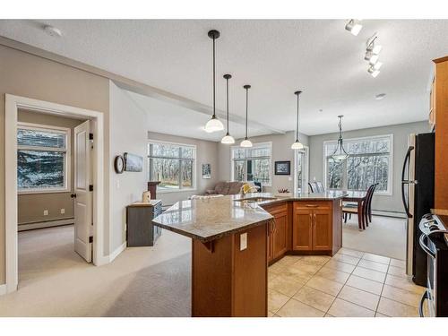 104-35 Aspenmont Heights Sw, Calgary, AB - Indoor Photo Showing Kitchen With Double Sink With Upgraded Kitchen