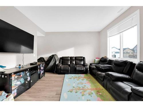 202-135 Redstone Ne, Calgary, AB - Indoor Photo Showing Living Room