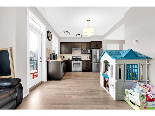 202-135 Redstone Ne, Calgary, AB - Indoor Photo Showing Kitchen With Stainless Steel Kitchen