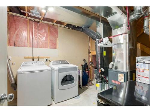 2038 Bridlemeadows Manor Sw, Calgary, AB - Indoor Photo Showing Laundry Room