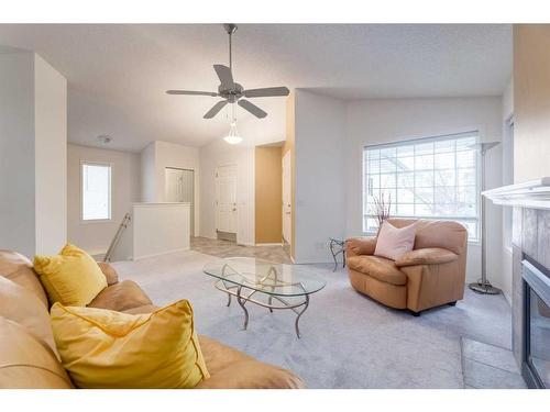 2038 Bridlemeadows Manor Sw, Calgary, AB - Indoor Photo Showing Living Room