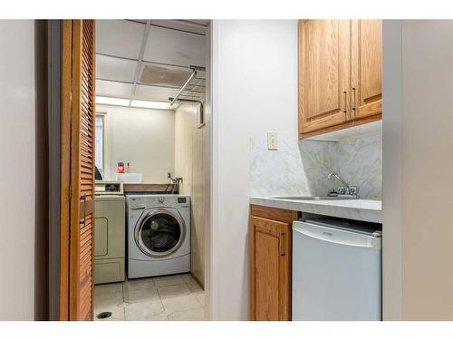 83 Chancellor Way Nw, Calgary, AB - Indoor Photo Showing Laundry Room