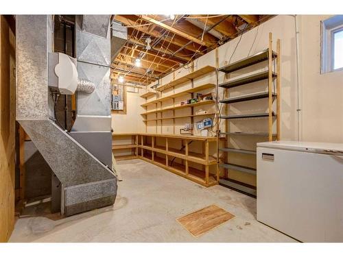 83 Chancellor Way Nw, Calgary, AB - Indoor Photo Showing Basement