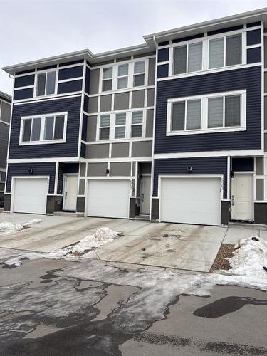 601-33 Merganser Drive West, Chestermere, AB - Outdoor With Facade