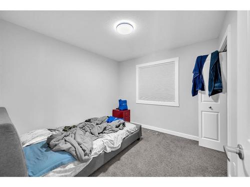 469 Creekrun Crescent Sw, Airdrie, AB - Indoor Photo Showing Bedroom