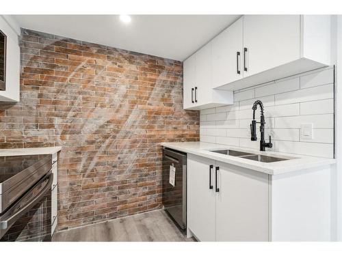 3008 15 Avenue Sw, Calgary, AB - Indoor Photo Showing Kitchen With Double Sink