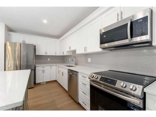 49 Edgeland Close Nw, Calgary, AB - Indoor Photo Showing Kitchen With Stainless Steel Kitchen With Upgraded Kitchen