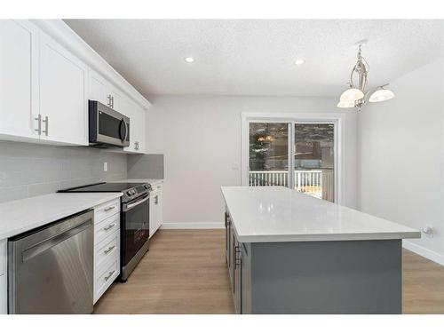 49 Edgeland Close Nw, Calgary, AB - Indoor Photo Showing Kitchen With Stainless Steel Kitchen With Upgraded Kitchen