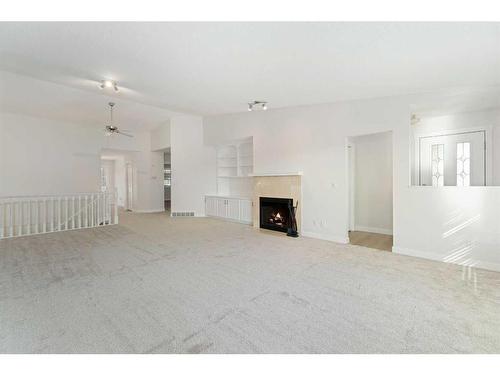 49 Edgeland Close Nw, Calgary, AB - Indoor With Fireplace