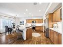 117 Drake Landing View, Okotoks, AB  - Indoor Photo Showing Kitchen With Stainless Steel Kitchen 