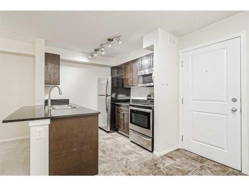 422-195 Kincora Glen Road Nw, Calgary, AB - Indoor Photo Showing Kitchen