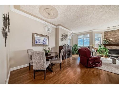 904-1726 14 Avenue Nw, Calgary, AB - Indoor With Fireplace