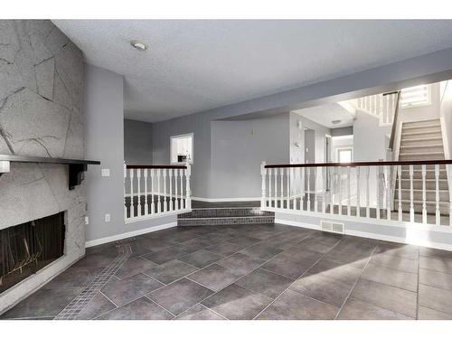 10-448 Strathcona Drive Sw, Calgary, AB - Indoor With Fireplace